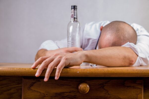 Man Struggling with Alcohol Addiction