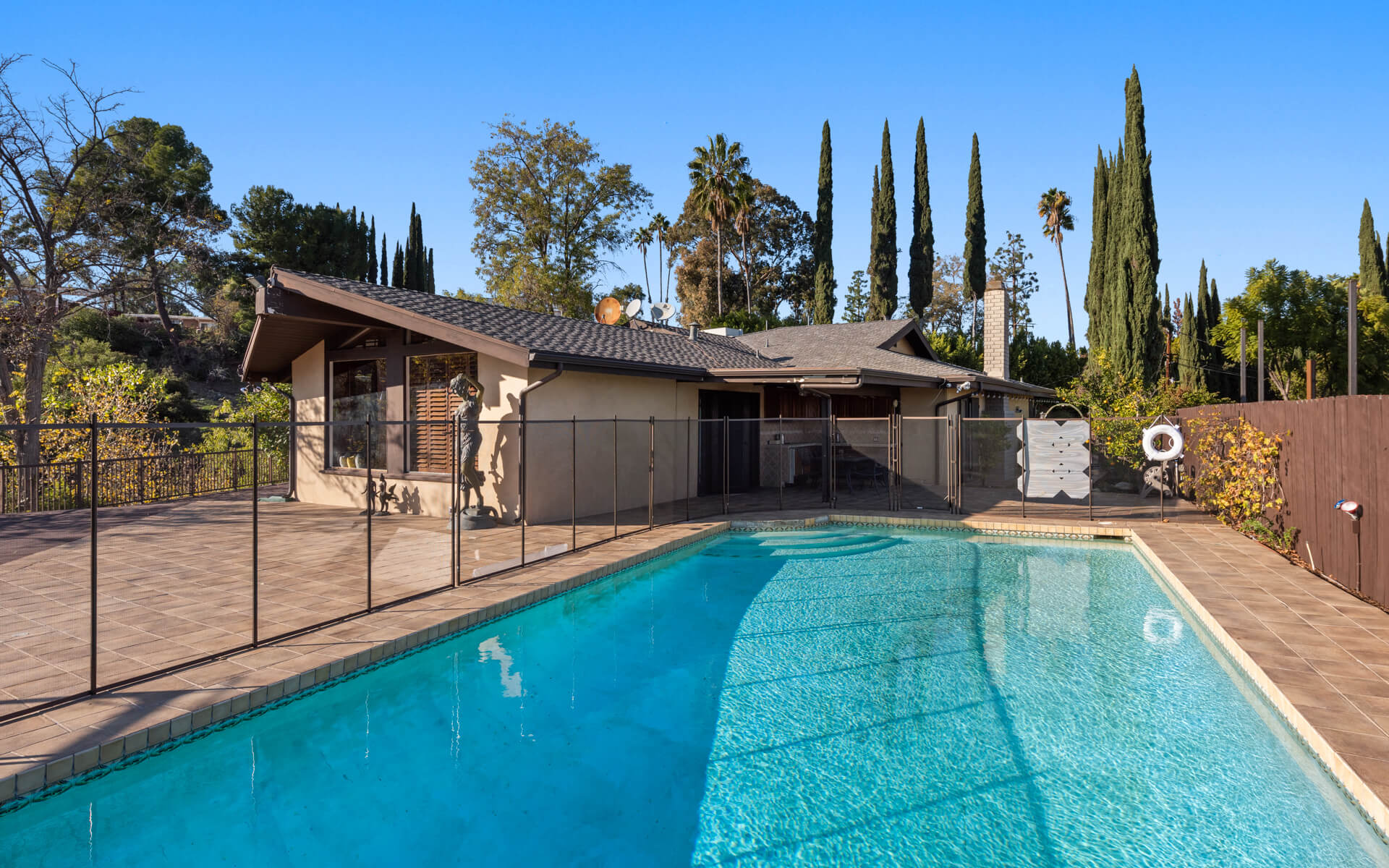 Hillside exterior of the Encino residence serving clients across Southern California